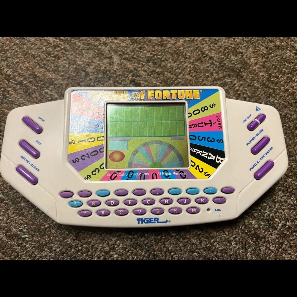 Tiger Electronics Wheel of Fortune Handheld Video Game - EUC